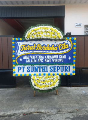 Papan Bunga Duka di Air Manis